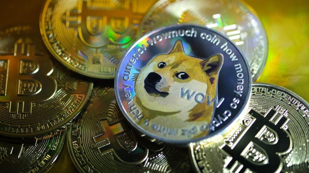 Closeup of Dogecoin coin resting on Bitcoin coins