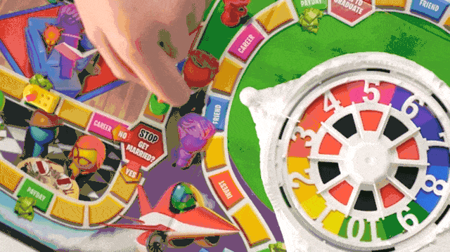 Game Of Life Sizzle with person spinning the spinner GIF small