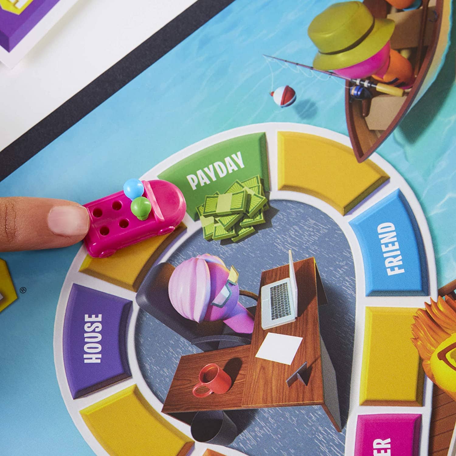 Game of Life 2021 'Your Life Your Way' in a lifestyle photoshoot with a close up on a pink car with 2 multi color pegs. Made by Hasbro Gaming