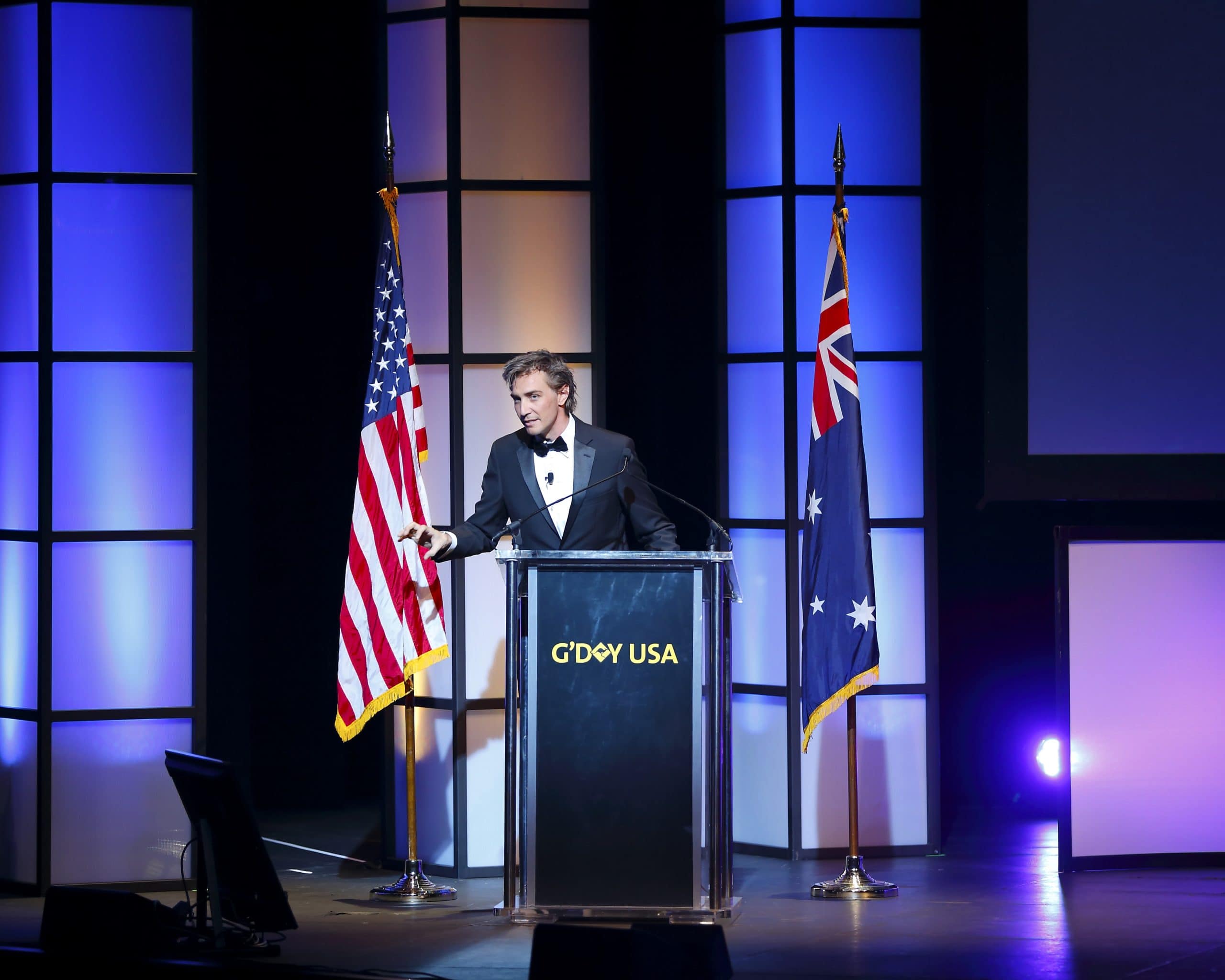 Gray Bright on stage at the Innovators Xchange G'Day USA innovation event