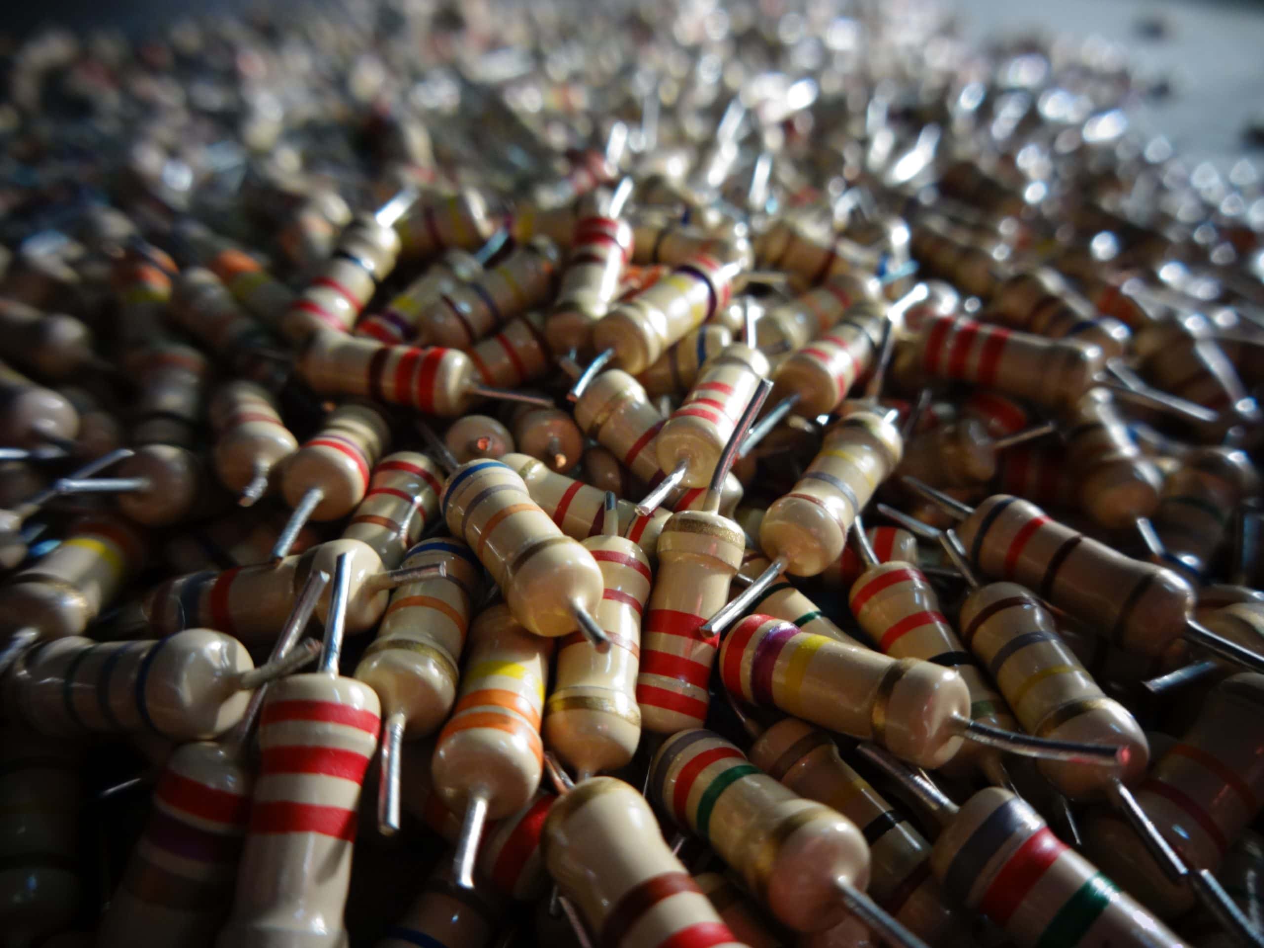 Close up of resistors with different values and with cut legs