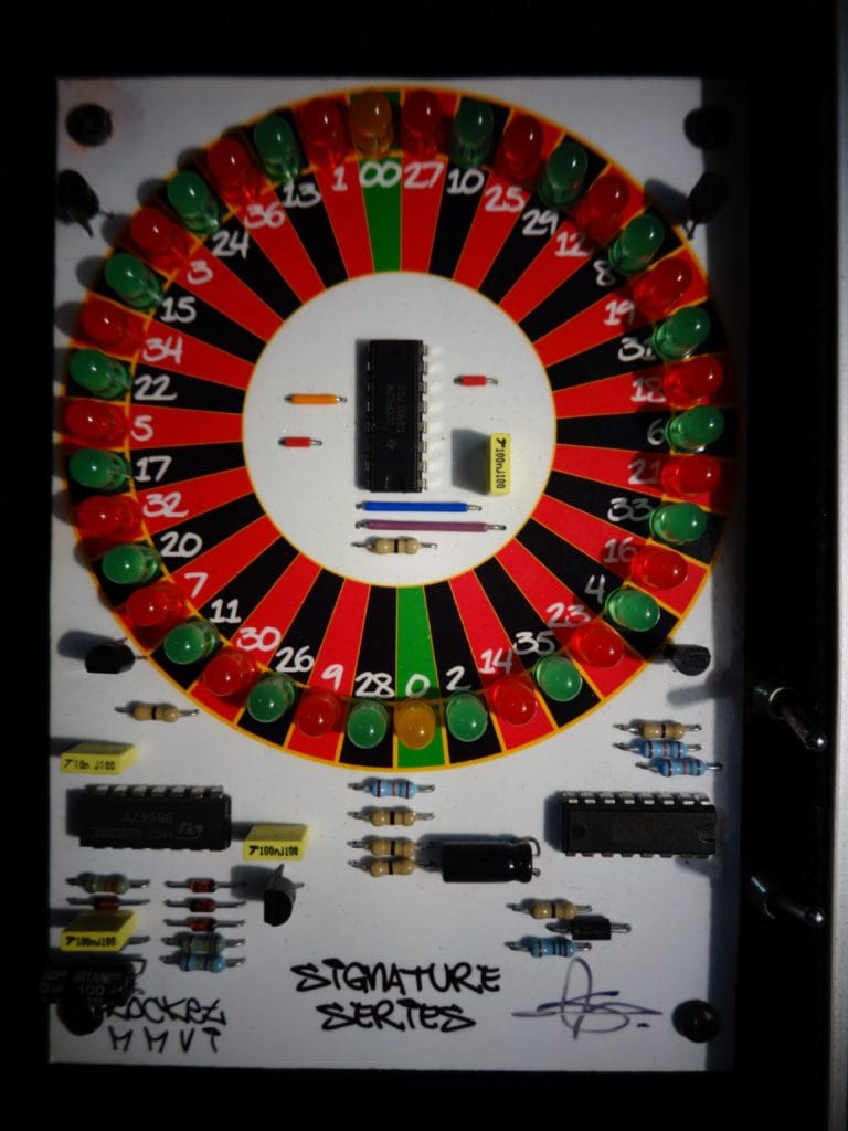 Portable Electronic Roulette Machine close up on the roulette board with LED's and signature series printed circuit board