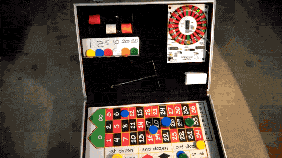 Portable Electronic Roulette Machine with chips on the play field and demonstration of the numbers going around in a MP4