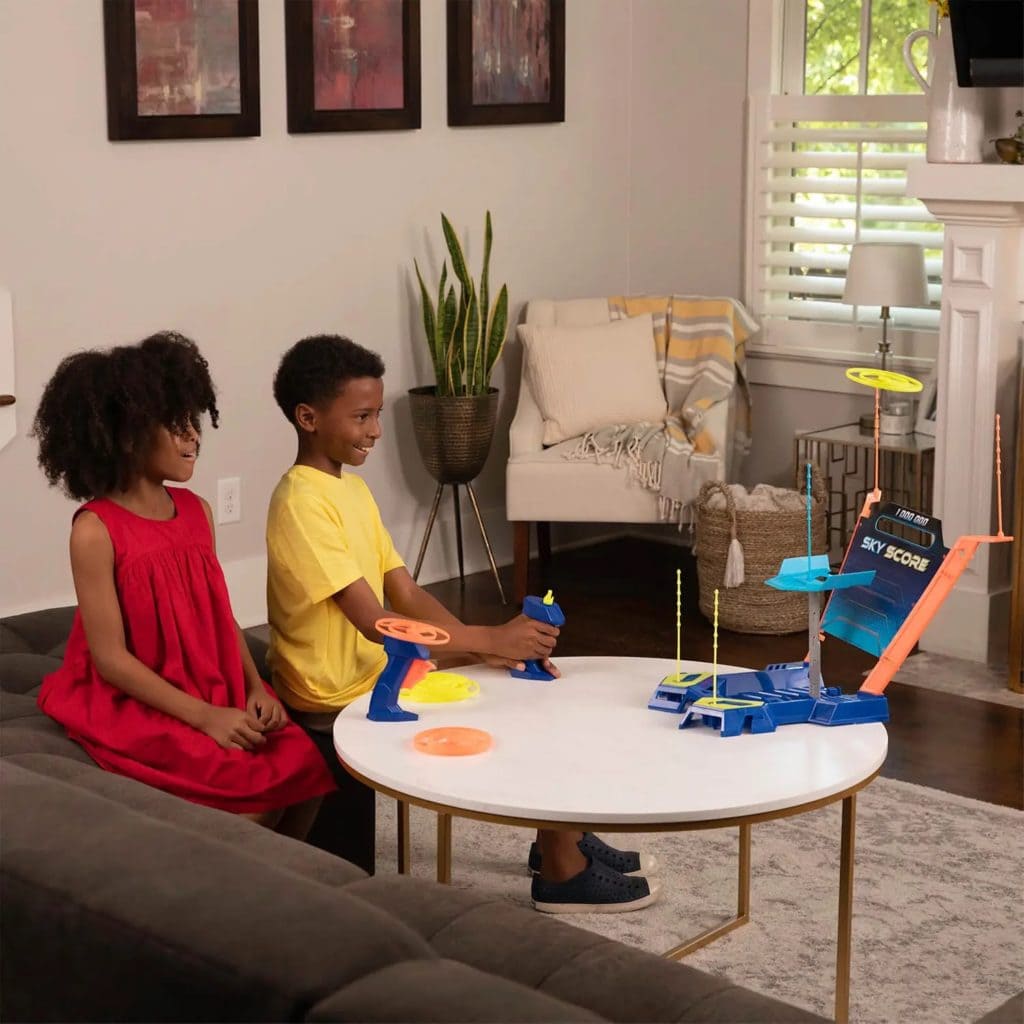 Sky Score Game Hasbro kids in lifestyle shot playing the game