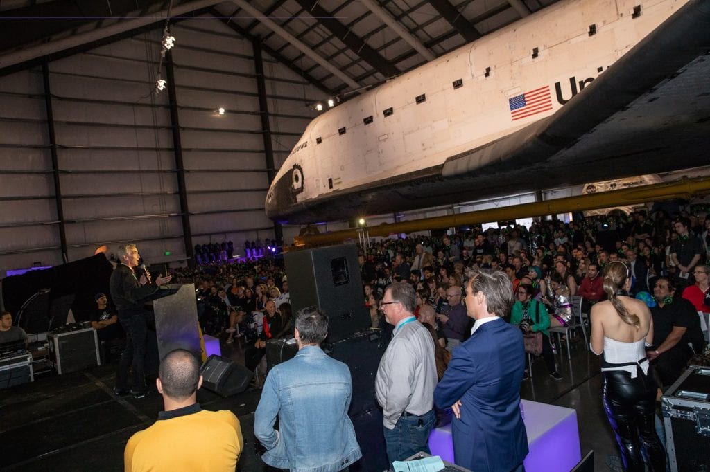 Yuri's Night Crowd with the Space Shuttle Endeavour in the background while Bill Nye is on stage